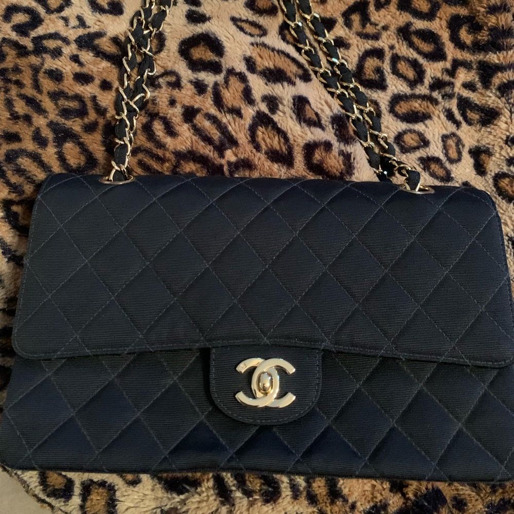 Chanel Satin  Quilted Medium double flap bag.